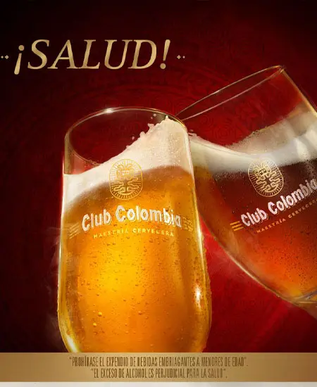 Cerveza Club Colombia Roja copa x 330ml en un fondo rojo texto SALUD