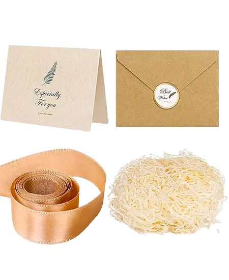 Caja Premium incluye tarjeta, sobre, cinta y relleno de papel
